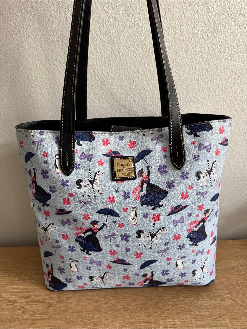 Dooney & Bourke Light Blue Mary Poppins Print Tote with Black Leather Handles